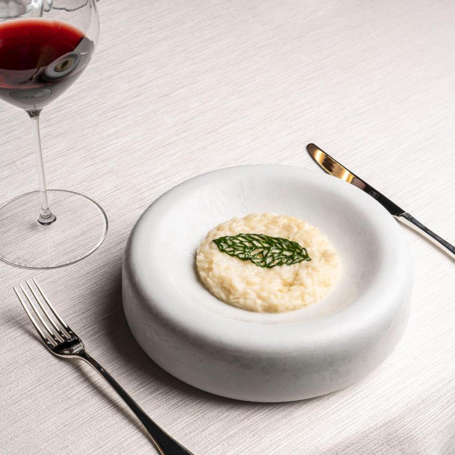 Lefay Resort & Spa Dolomiti Pinzolo Esterno foto A risotto prepared with the traditional method